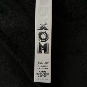 Buxom full on plumping lip cream in creamsicle